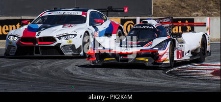 Monterey, CA, USA. 09th Sep, 2018. A. # 25 Drivers Alexander Sims/Connor DE Phillppi # 7 Helio Castroneves/Ricky Taylor battle for position coming out of turn 11 during the American's Tire 250 Race for the IMSA Weathertech Sport Car Championship at Weathertech Raceway Laguna Seca Monterey, CA Thurman James/CSM/Alamy Live News Stock Photo