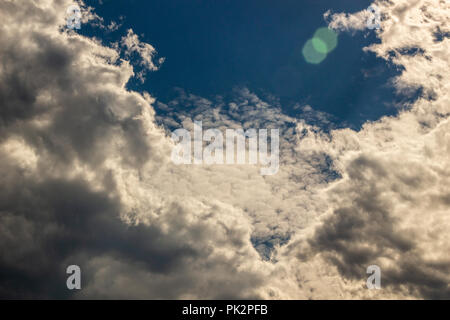 Clouds against the blue sky Stock Photo