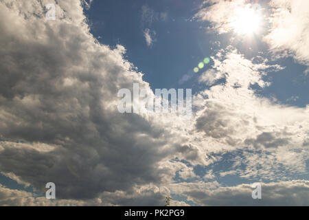 Clouds against the blue sky Stock Photo