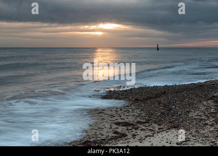 Sunrise at Cart Gap, Eccles on the Norfolk Coast, UK. Stock Photo