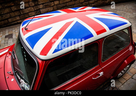 A Red Mini Cooper and closeup wth a Union Jack Roof by John Cooper Stock Photo