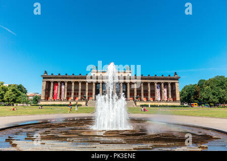 Lustgarten fountain by the neoclassical building of the Altes Museum in Berlin. Stock Photo