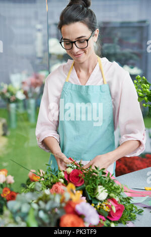 Florist Arranging Bouquets Stock Photo