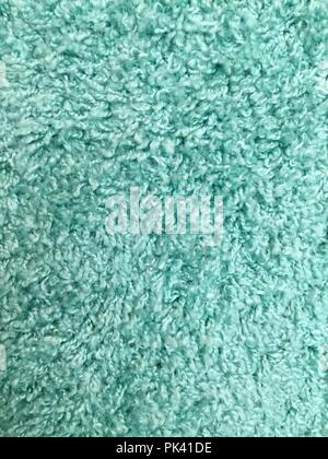 Teal carpet background closeup. Stock Photo