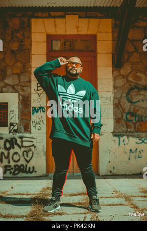 Man modeling at abandoned train station Stock Photo