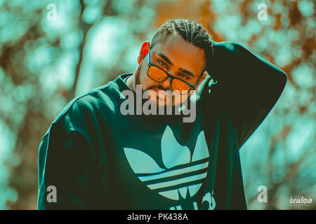 Man modeling at abandoned train station Stock Photo