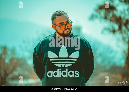 Man modeling at abandoned train station Stock Photo