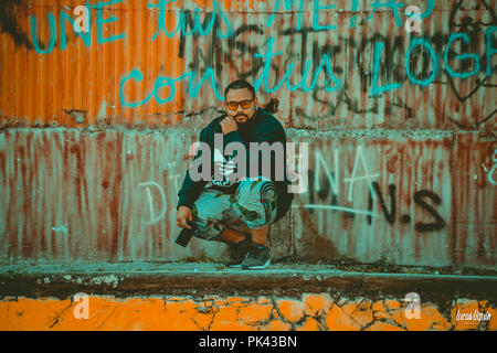 Man modeling at abandoned train station Stock Photo