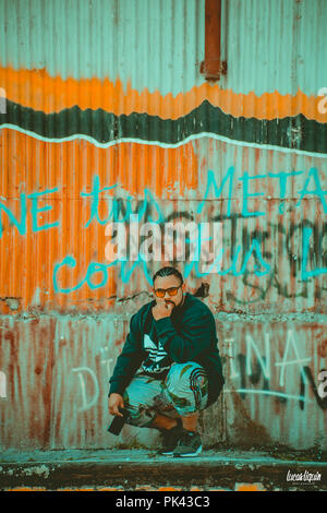 Man modeling at abandoned train station Stock Photo