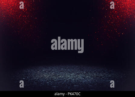 dark concentrate or asphalt floor with dark red and black glitter background Stock Photo