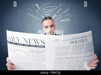 Confused businessman holding newspaper c Stock Photo