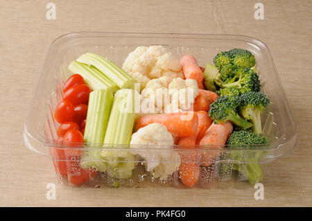 Store bought container of prepared vegetables Stock Photo