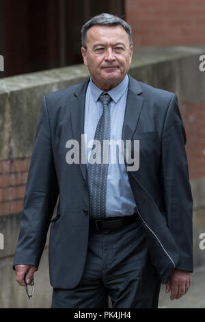 Lorry driver Zbigniew Grzabel leaves Stafford Crown Court, where he denies five counts of causing death by dangerous driving and causing serious injury by dangerous driving after four women and a man died and another passenger was injured, in a crash on the M6 southbound carriageway last year. Stock Photo