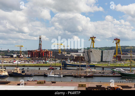 High level view of Belfast docks with Harland & Wolff shipbuilders cranes, Samson & Goliath, in view behind the Titanic Building. Belfast, N.Ireland. Stock Photo