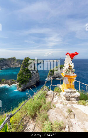 Portrait of a Balinese Hindu shrine and beautiful tropical islands on Nusa Penida. Stock Photo