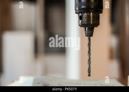 Close up on a professional grade wood drill bit used in a old retro carpentry workshop   Picture of a drill bit, retro style, professional grade, desi Stock Photo