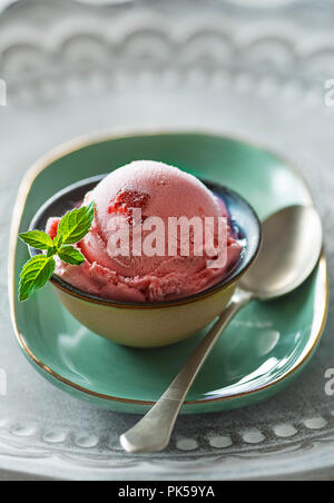 Homemade organic fruit ice cream scoops in bowl Stock Photo