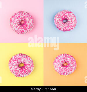 Four sweet doughnuts on color background. Fashion minimal Stock Photo