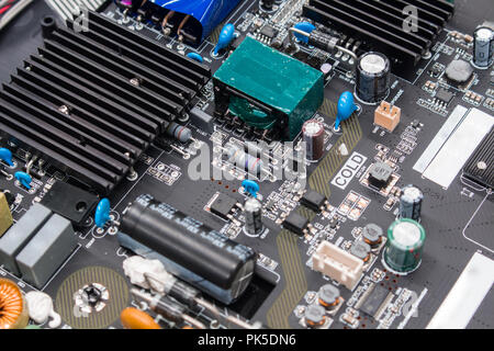 Closeup on electronic board in hardware repair shop Stock Photo