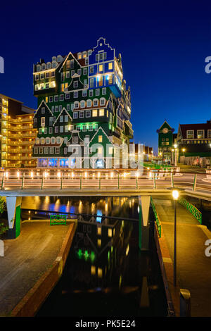 Inntel Hotel in Zaandam illuminated at night, Netherlands Stock Photo