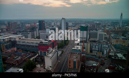 Birmingham, England - June 08 2016: skyline at sunset. Shot at a high angle facing west with the Mailbox retail center in the foreground Stock Photo