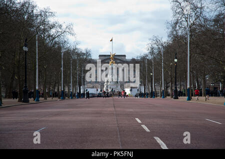 LONDON, ENGLAND – MARCH 2013: Buckingham Palace viewed from the centre of the Mall clear of traffic. Stock Photo
