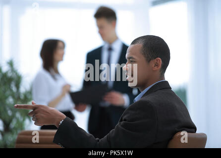 concept of purpose confident businessman pointing forward Stock Photo