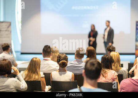 Business speakers giving a talk at business conference event. Stock Photo