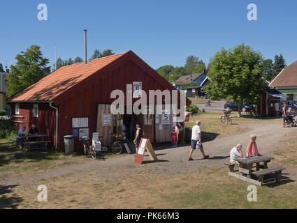 Forsvik on the Göta canal, view from a boat cruise along an idyllic waterway in Sweden, shop wit local souvenirs Stock Photo