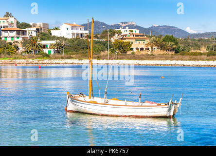 Romantic view of old fishing boat at coast of Portopetro on Mallorca island, Spain Mediterranean Sea Stock Photo