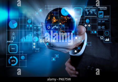Financial report data of business operations (balance sheet and income statement and diagram) as Fintech concept.Businessman showing the globe world Stock Photo