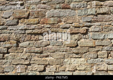 Looking upon masonry sandstone background close to Stock Photo