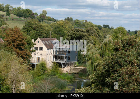 A view of Weavers Mill and Avoncliff Weir on the River Avon near Bradford on Avon, Wiltshire, UK Stock Photo