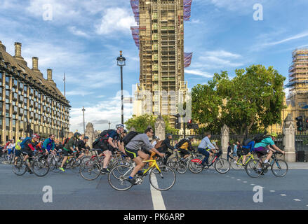 10 September 2018 - London, England. Busy rush hour scene in Parliament Square. Active Londoners cycling from work.