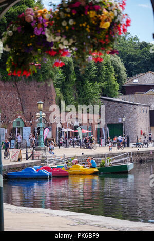 Old bonded warehouses now craft shops River Exe Exeter Quay Exeter Devon England Stock Photo