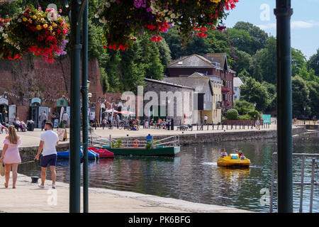 Old bonded warehouses now craft shops River Exe Exeter Quay Exeter Devon England Stock Photo