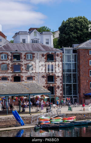 Old bonded warehouses now craft shops River Exe Exeter Quay Exeter Devon England Stock Photo