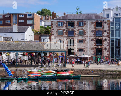 Old bonded warehouses now craft shops River Exe Exeter Quay Exeter Devon England Stock Photo