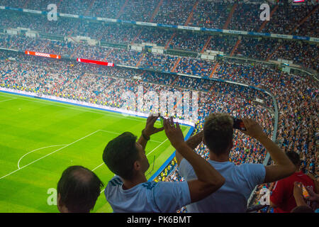 People taking selfies at Santiago Bernabeu stadium. Madrid, Spain. Stock Photo