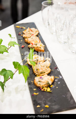 Bread Toasts on Natural Slate Catering Tray Stock Photo