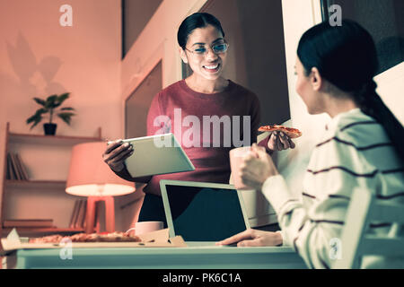 Smiling women discussing their new project Stock Photo