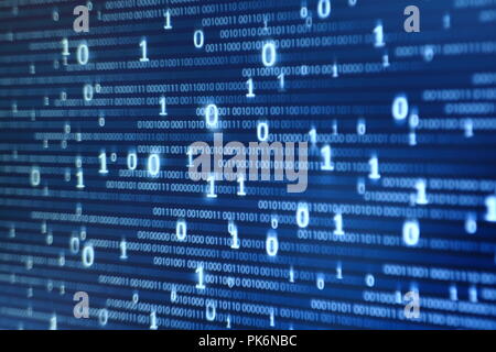 Computer display screen with binary code moving in the background. text moving in matrix code style from top moving downward to the bottom Stock Photo