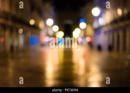 Blurred background. Night city lights blur. Retro toned photo, vintage style Stock Photo