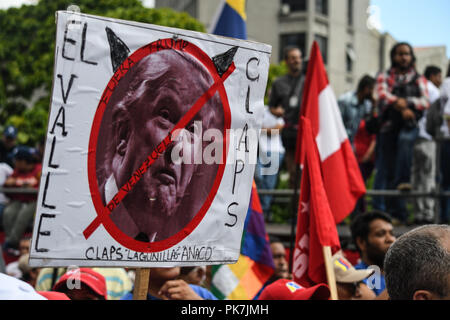 Caracas, Distrito Capital, Venezuela. 11th Sep, 2018. Anti Trump placard seen during the rally.March called by the vice president of the United Socialist Party of Venezuela (PSUV), Diosdado Cabello, against the accusations and investigations made by the US government to political leaders of President Maduro's administration. Credit: Roman Camacho/SOPA Images/ZUMA Wire/Alamy Live News Stock Photo