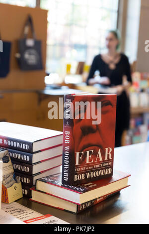 Seattle Washington: Bob Woodward's book 'Fear: Trump in the White House' on sale at Elliott Bay Book Company on September 11, 2018. Woodward interviewed many members of the Trump administration for the newly published book, ultimately concluding that the white house is chaotic and dysfunctional. A respected journalist for decades, Woodward was first made famous for his reporting on the Watergate scandal in 1972. Stock Photo