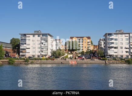 Kanaltorget and surrounding residential buildings seen from across the Göta river in Trollhättan an industrial town in Västra Götaland, Sweden Stock Photo