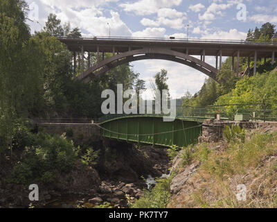 Håverud in Dalsland province Sweden,where the tourist attraction Dalslands canal passes by an aqueduct bridge, road bridge high above Stock Photo