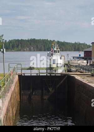 Håverud in Dalsland province Sweden,where the tourist attraction Dalslands canal passes through locks and an aqueduct, sightseeing boat for day cruise Stock Photo