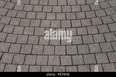 Paving stone laid in a semicircle. Close-up. Stock Photo