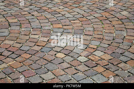 Paving stone laid in a semicircle. Close-up. Stock Photo